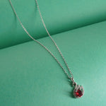 925 sterling silver chain necklace design with red stone peacock pendant .