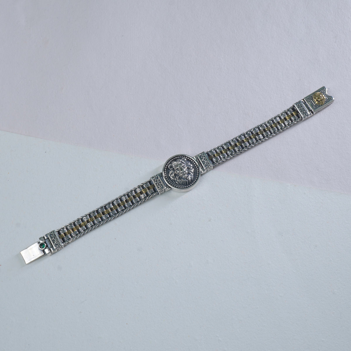 Close-up of 3 layer cylinder design in 925 silver dual tone bracelet
