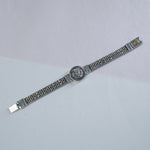Close-up of 3 layer cylinder design in 925 silver dual tone bracelet
