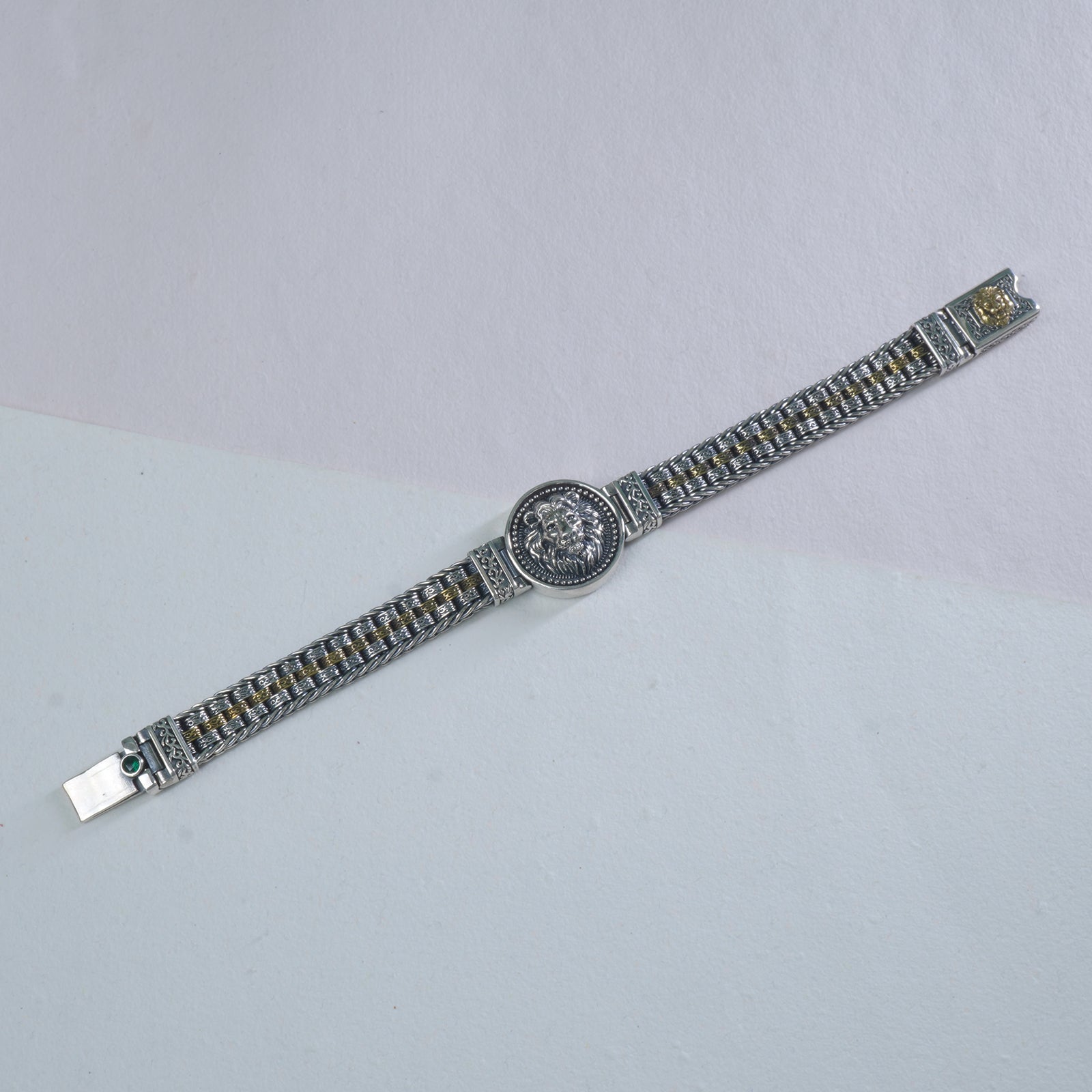 Close-up of 3 layer cylinder design in 925 silver dual tone bracelet
