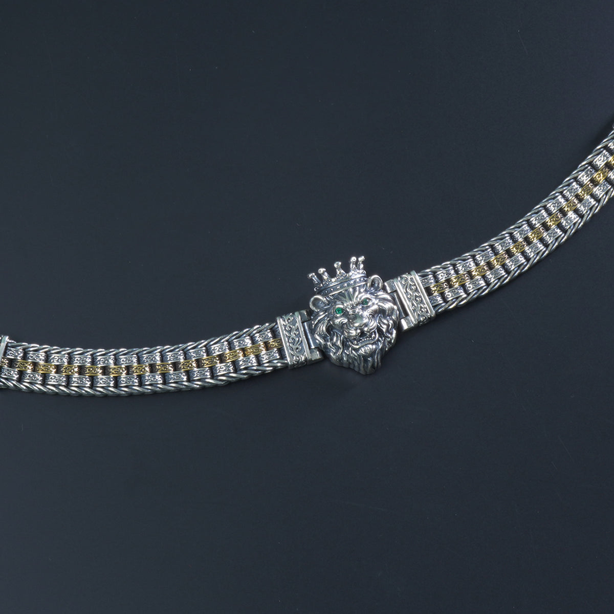 Close-up of Eye of Tiger stone in dual tone 925 silver bracelet
