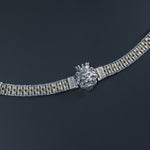 Close-up of Eye of Tiger stone in dual tone 925 silver bracelet
