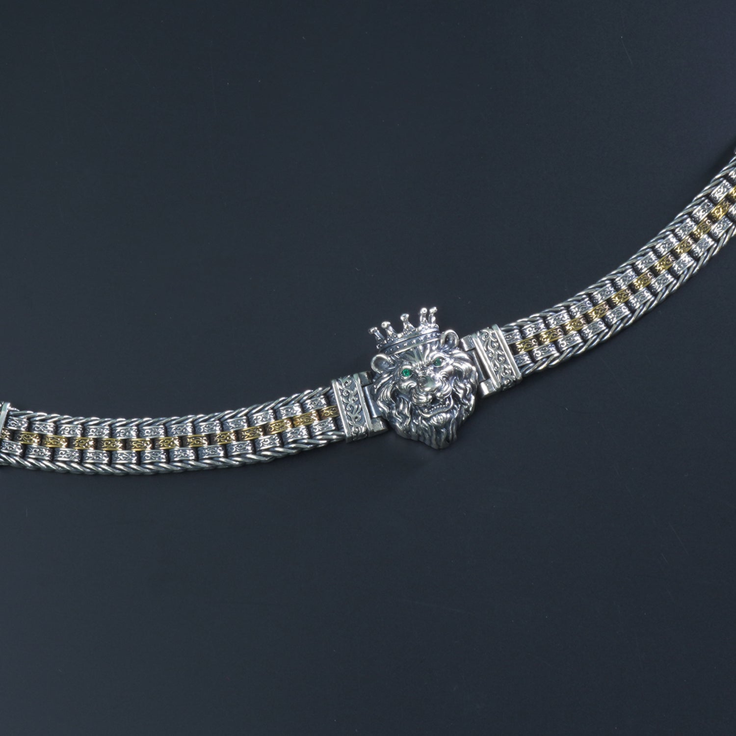 Close-up of Eye of Tiger stone in dual tone 925 silver bracelet
