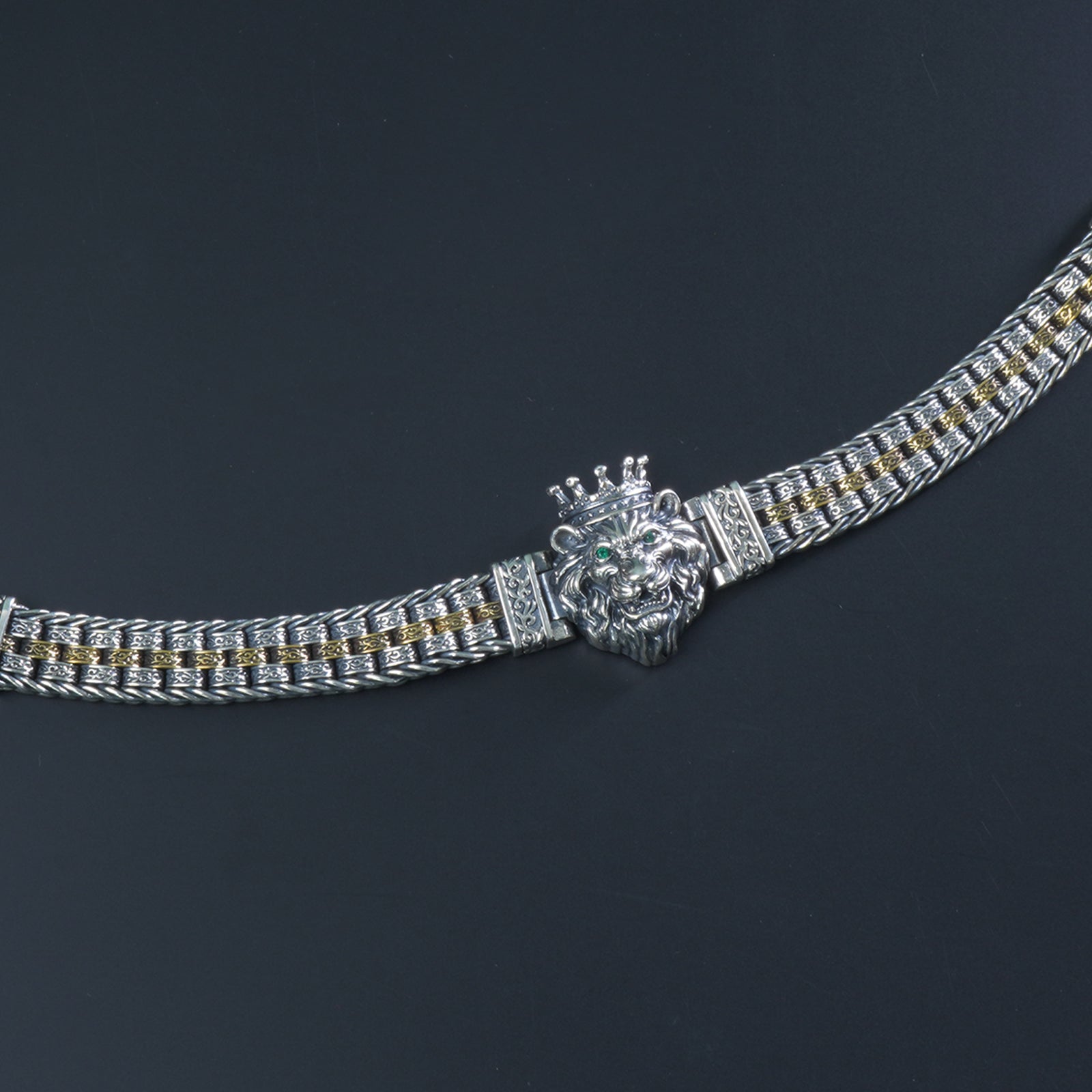Close-up of Eye of Tiger stone in dual tone 925 silver bracelet
