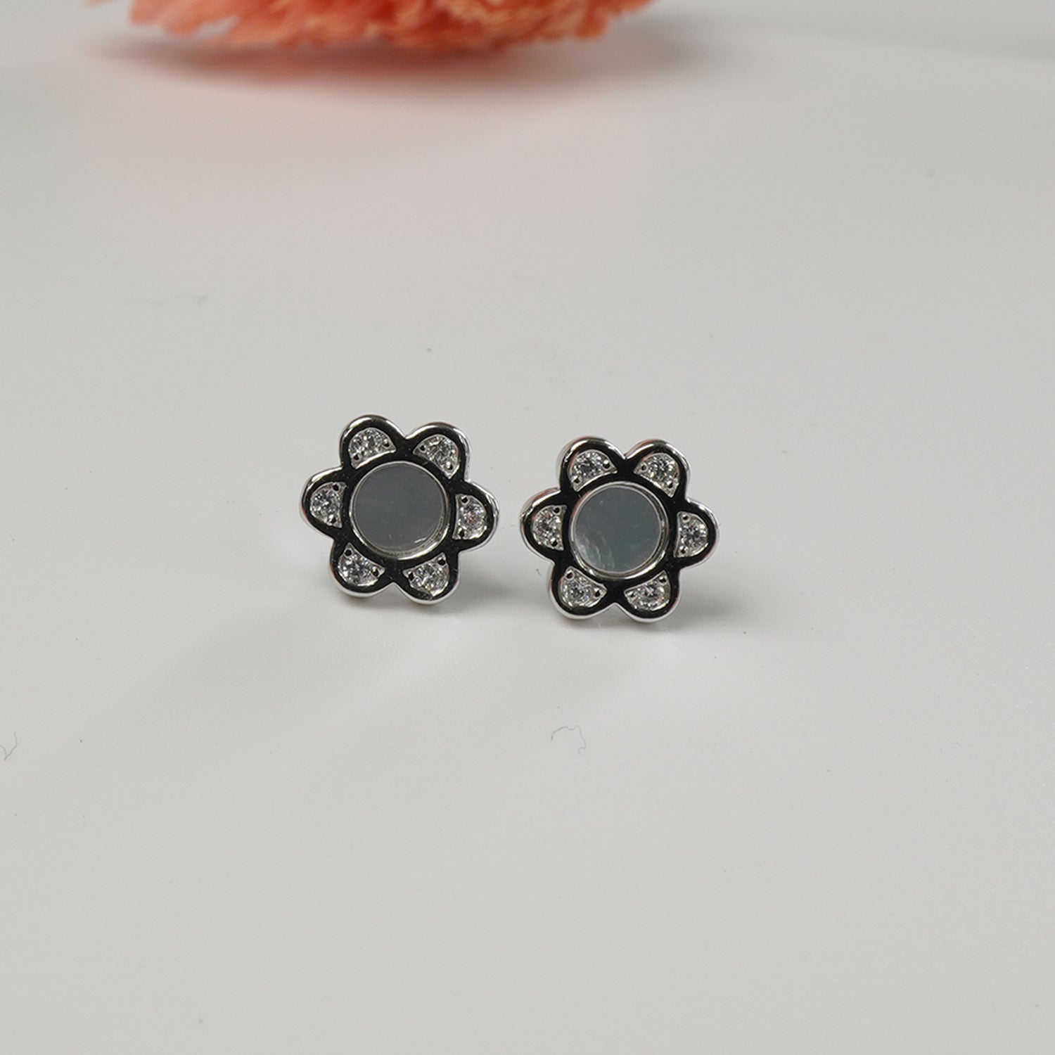 Lightweight silver earrings detail