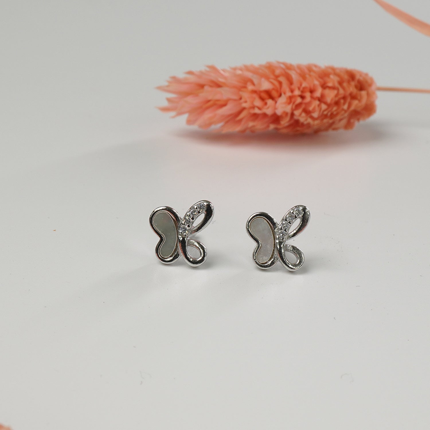 Minimal silver earrings for daily wear detail