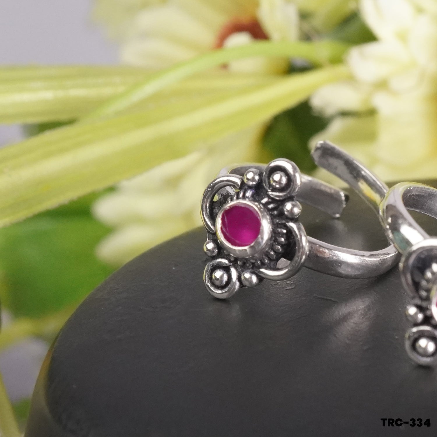 Pure silver toe ring with red stones